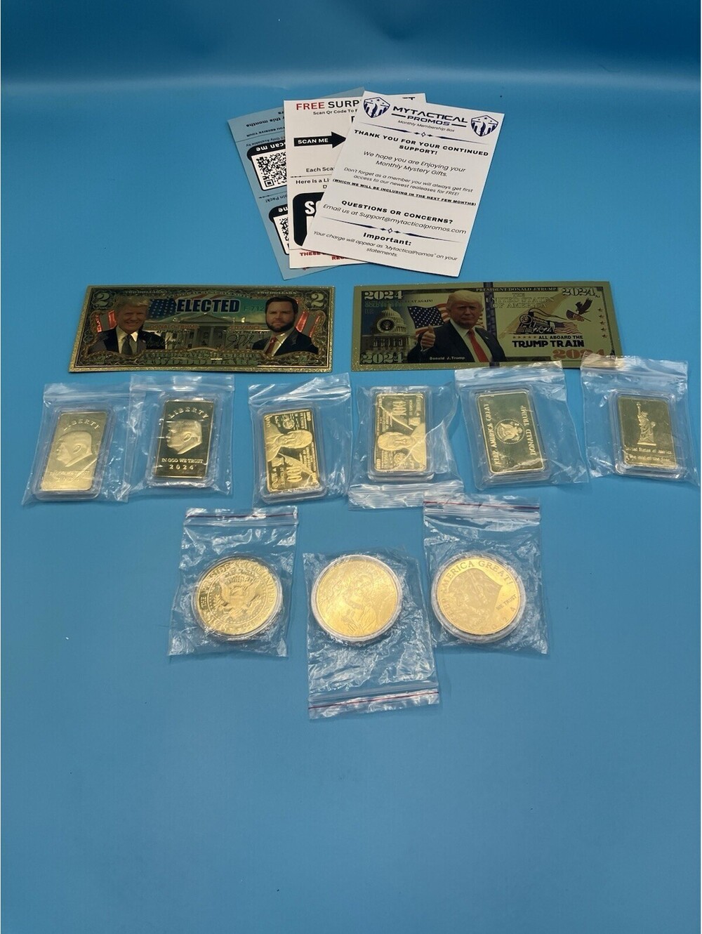 Set of 11-Donald Trump 24K Gold Foil Commemorative Bars, Coins And Dollars